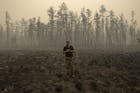 In Jakoetië branden de bossen en zakt de aarde in
